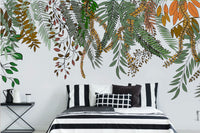 Papier peint représentant des plantes grimpantes aux teintes automnales  évoquant une ambiance chaleureuse et saisonnière.