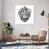 Tableau Lion maori dans salon fauteuils cannage